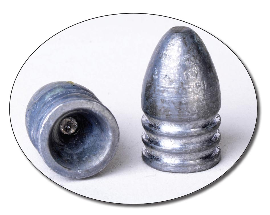The Lyman Minié ball (575213OS, Old Style) weighs 460 grains. The bullet at left shows a pin-hole in the hollowbase because the mould and molten lead were not hot enough for perfect casting.